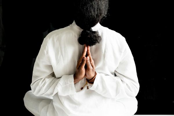 Man meditating with focus on inner strength